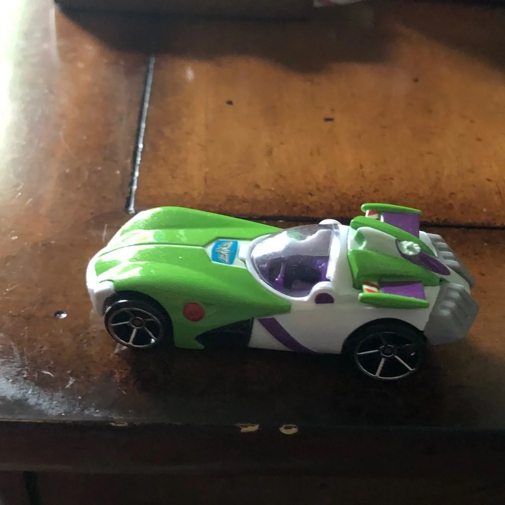 Green Toy Race Car with Purple Accents
